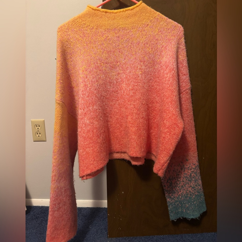 High neck, bright colored sweater